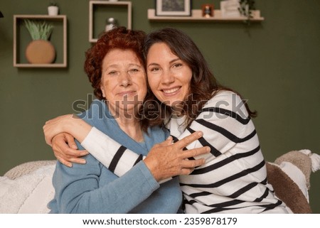 Similar – Female caretaker posing with elderly patient