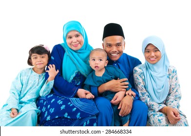 Portrait Of A Cheerful Malay Family