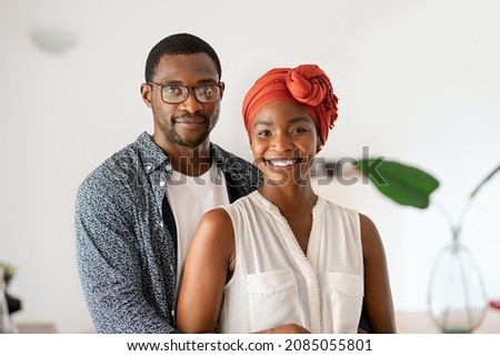 Similar – Image, Stock Photo A middle-aged couple hugging each other and observing a sunset sea, we see them from the back