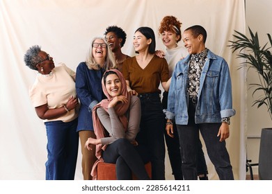 Portrait of cheerful mixed age range multi ethnic women celebrating International Women's Day - Shutterstock ID 2285614211