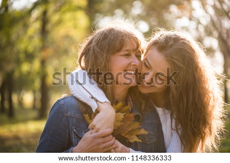 Similar – Image, Stock Photo Woman holding autumn leaves in her hands