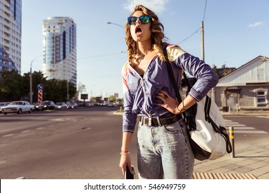 Portrait Of Cheerful Smiling Woman With Curls,open Mouth,rebel Student.Woman Argue, Girl Doesn't Like,scream.Woman In Glasses,girl With Glasses.Says No,unsatisfied