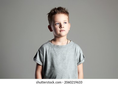 Portrait Of Child. Cute Kid In Shirt. Handsome Teen Boy. Children