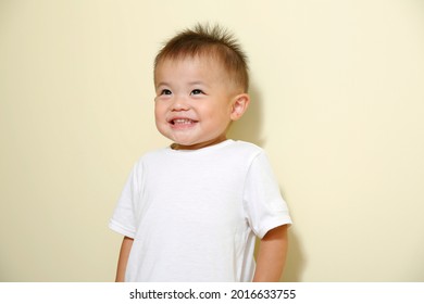 Portrait of a child looking at the camera while laughing 