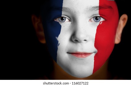 Portrait Of A Child With A Painted French Flag, Closeup