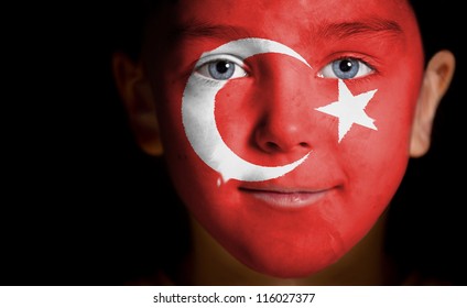 Portrait Of A Child With A Painted  Turkish Flag, Closeup