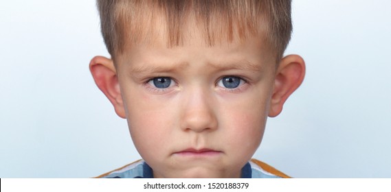 Portrait Of A Child With Protruding Ears