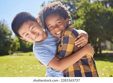 Portrait, children and friends hugging in a park together for fun, bonding or playing in summer. Hug, kids and diversity with boy best friends embracing in a garden in the day during school holidays - Shutterstock ID 2281563737