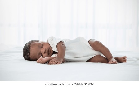 Portrait of close up black African American baby face sleep tight peaceful, hospital daycare nursery for new born baby. Love family healthcare and medical, mother or father's day, love tender concept - Powered by Shutterstock