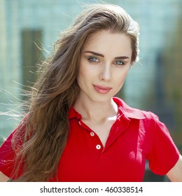 Portrait Close Up Of Young Beautiful Brunette Woman In Red Polo, Summer Outdoors