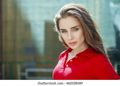 Portrait Close Up Of Young Beautiful Brunette Woman In Red Polo, Summer Outdoors