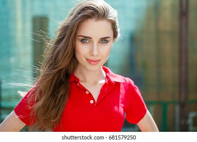 Portrait Close Up Of Young Beautiful Brunette Woman In Red Polo, Summer Outdoors