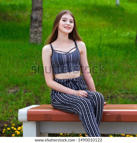 Portrait close up of young beautiful happy woman, summer outdoors