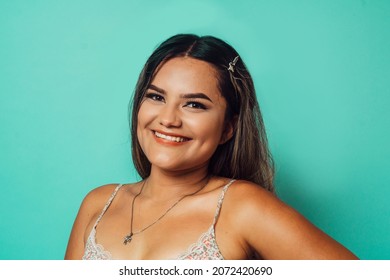 Portrait Close Up Of A Young Latinx Woman Looking At Camera.