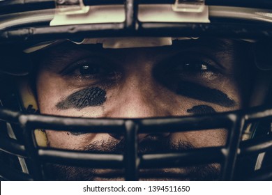 Portrait close-up, American football player, bearded in helmet. Concept American football, patriotism, close-up. - Powered by Shutterstock