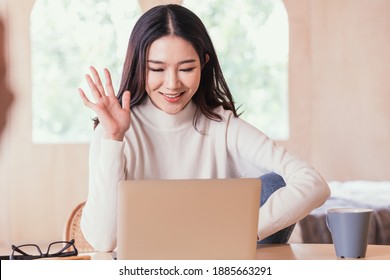 Portrait Close-up Of A Good-looking, Beautiful Face, Charming Asian Women, Cute. She Uses A Laptop To View Online Content. Young Woman Making Facetime Video Calling Home. She Smiles And Happy