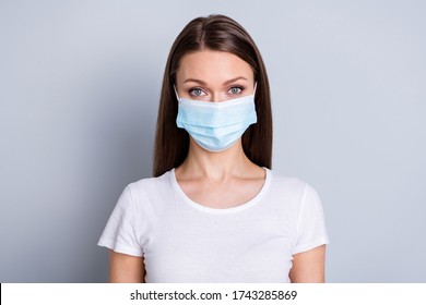 Portrait closeup photo of pretty lady keep social distance people contacting came hospital examination patient wear protect face medical mask white t-shirt isolated grey color background - Shutterstock ID 1743285869