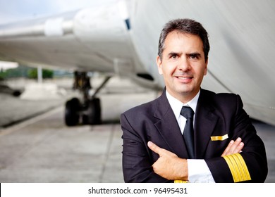 Portrait Of A Commercial Airplane Pilot Smiling