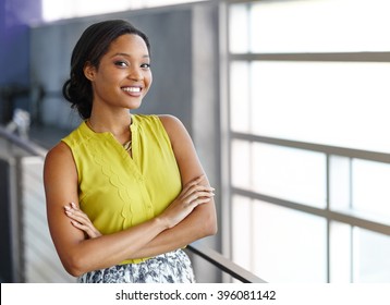 Portrait of a confident black businesswoman at work in her glass office