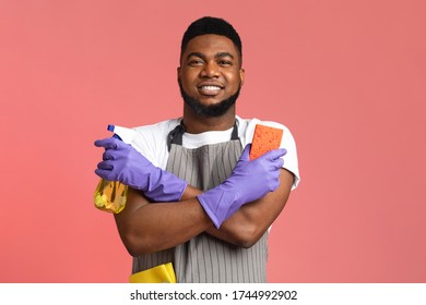 Portrait Of Confident Black Janitor Wearing Apron With Sponge And Spray Detergent In Hands