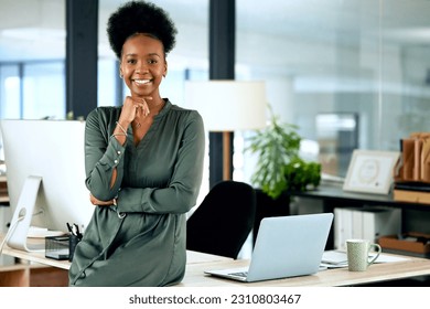 Portrait of confident black woman in modern office with smile, computer and African entrepreneur with pride. Happy face of businesswoman at small business startup and female boss at management agency