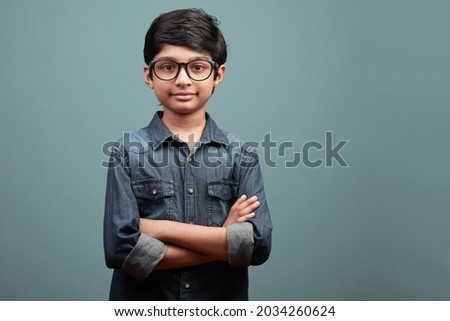 Portrait of a confident boy of Indian ethnicity