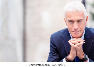 Portrait of confident businessman outdoors - Shutterstock ID 364740911