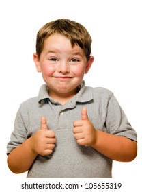 Portrait Of Confident Child Showing Thumbs Up Isolated One White