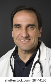 Portrait Of A Confident Doctor On Dark Background