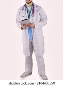 Portrait Of A Confident Doctor With Tablet Isolated On White Background