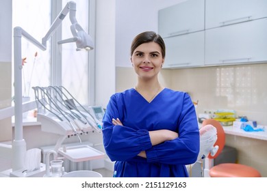 Portrait Of Confident Female Dentist Doctor In Office Looking At Camera