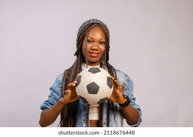 Portrait Of Confident Female Goalie Holding Ball