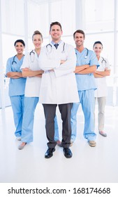 Portrait Of Confident Happy Group Of Doctors Standing At The Medical Office