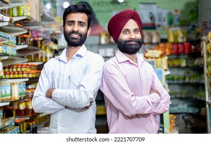portrait of confident Indian  grocery store owner  - Shutterstock ID 2221707709