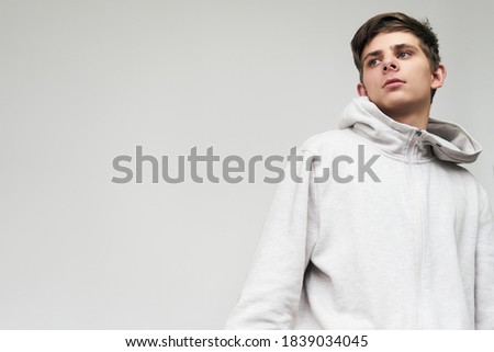 Portrait of a confident man of Caucasian 20-19 years old, copy space