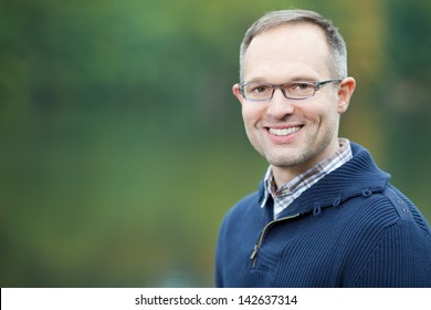 Portrait Of Confident Mature Man Smiling