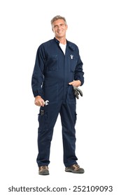 Portrait Of Confident Mature Mechanic With Wrench Looking At Camera Standing Isolated On White Background