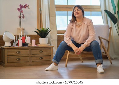 Portrait Portrait Of A Confident Mature Woman. Smiling Woman Looking At Camera With Big Grin. Successful Middle Aged Woman At Home Smiling.