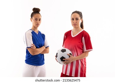 Portrait of confident multiracial young female soccer players standing against white background. unaltered, sport, sports uniform, soccer ball, athlete and women's soccer. - Powered by Shutterstock