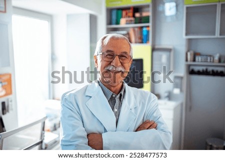Portrait of a confident senior doctor in medical office