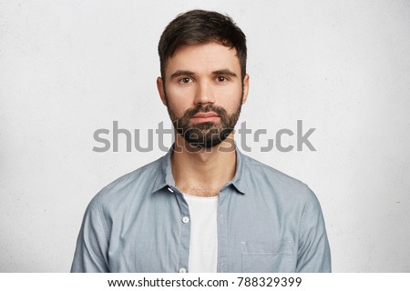 Similar – Image, Stock Photo Portrait of a bearded mature adult casual businessman with glasses looking into camera