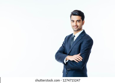 Portrait of a confident smiling businessman with arms crossed