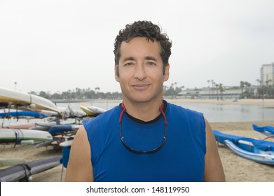 Portrait of confident sportsman in marina - Powered by Shutterstock