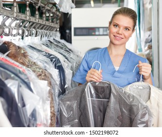 Portrait Of Confident Successful Female Worker Of Modern Dry Cleaner Salon