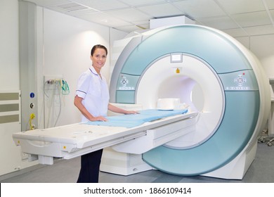 Portrait Of A Confident Technician Nurse At MRI Scanner In The Hospital