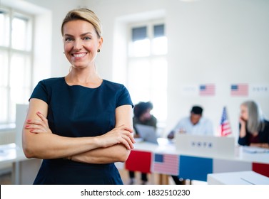 Portrait Of Confident Woman Voter In Polling Place, Usa Elections Concept.