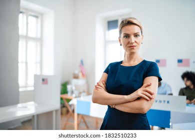 Portrait Of Confident Woman Voter In Polling Place, Usa Elections Concept.