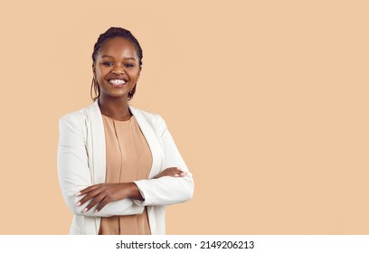 Portrait of confident young African American businesswoman isolated on orange studio background show leadership. Successful black female employee or professional. Copy space. Diversity. - Powered by Shutterstock