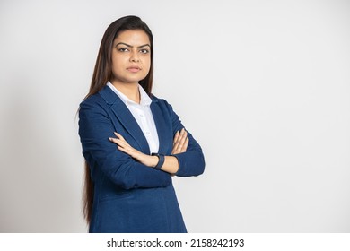 Portrait Of A Confident Young Indian Business Woman In A Suit Standing With His Arms Cross, Isolated On White Studio Background. Successful Asian Female Ceo Of Company, Executive Manager.