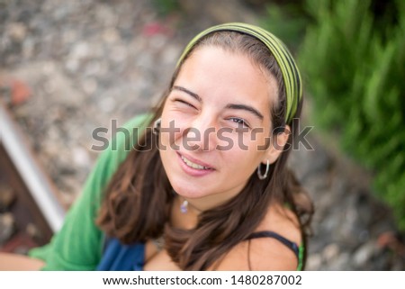 Similar – Portrait of a beautiful young woman outdoor smiling